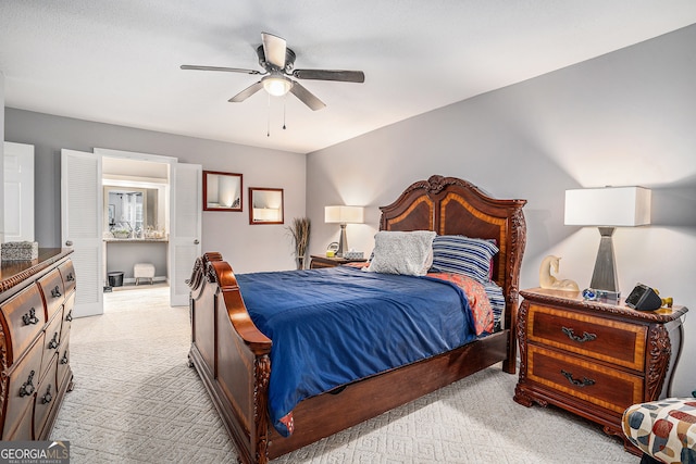 bedroom featuring light colored carpet and ceiling fan