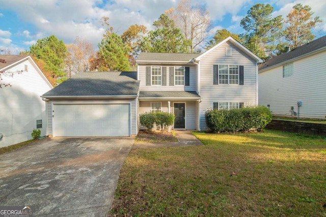 front facade featuring a front lawn and a garage