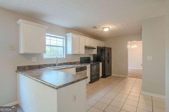 kitchen with white cabinets, sink, black appliances, and a textured ceiling