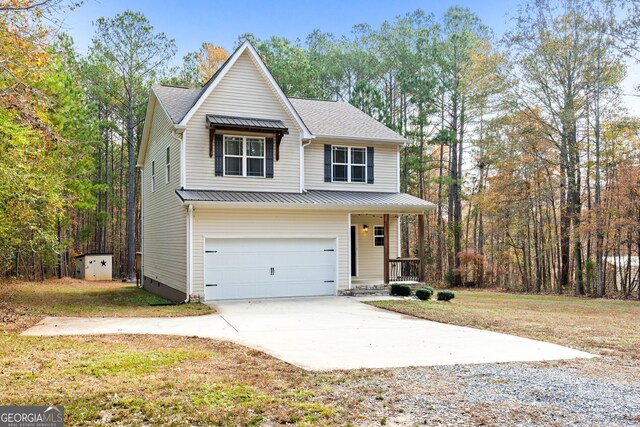 view of front facade featuring central AC unit, a garage, and a front lawn