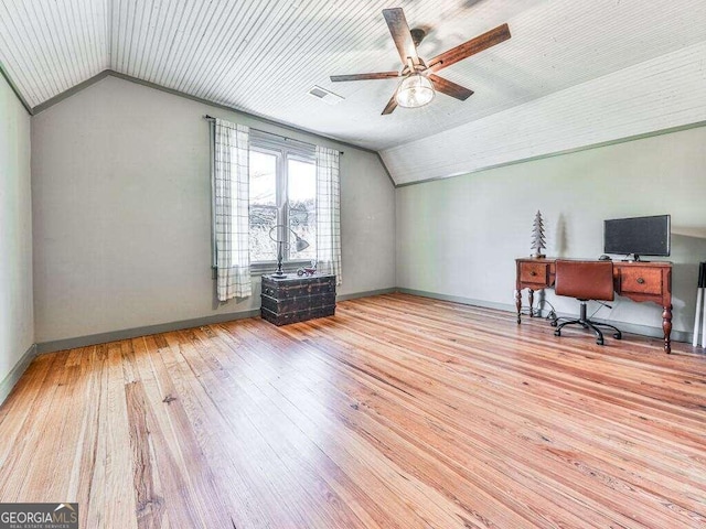 unfurnished office with ceiling fan, light hardwood / wood-style floors, and lofted ceiling