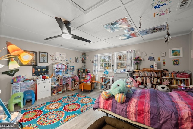 bedroom with crown molding, ceiling fan, and light hardwood / wood-style flooring