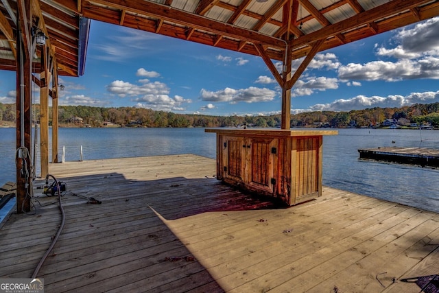 dock area featuring a water view and a gazebo