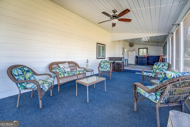 view of patio featuring ceiling fan and outdoor lounge area