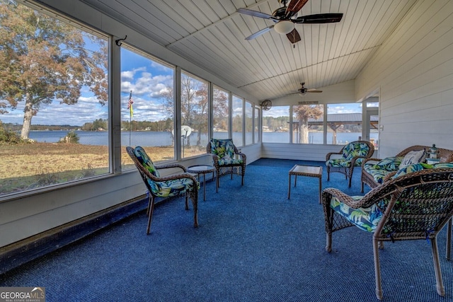 sunroom / solarium with a water view, wooden ceiling, lofted ceiling, and ceiling fan