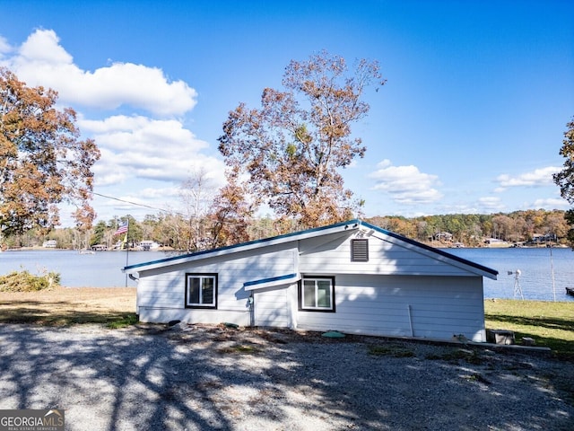 view of side of property featuring a water view