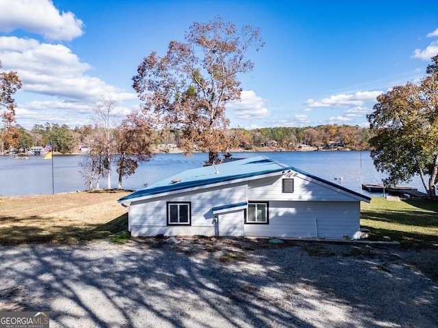 exterior space featuring a water view