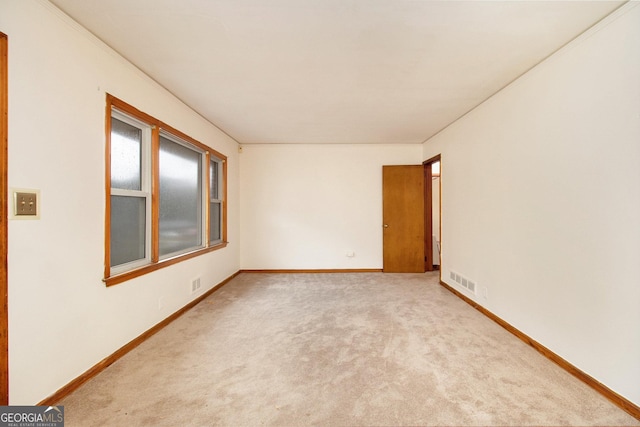 view of carpeted spare room