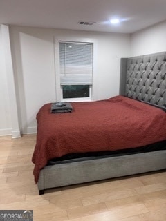 bedroom featuring light hardwood / wood-style floors