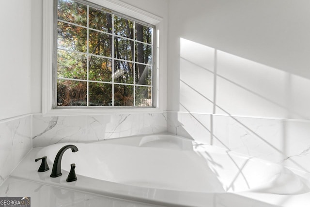 bathroom with plenty of natural light