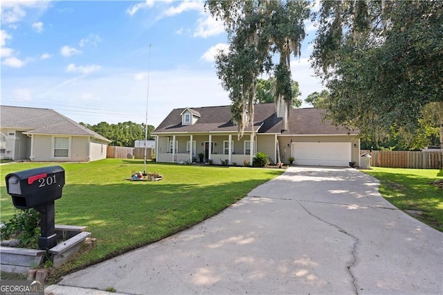 view of front of property with a porch, a garage, and a front yard