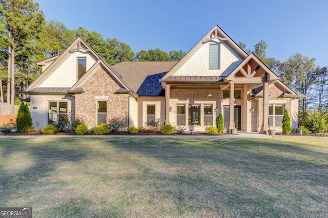 craftsman house with a front yard