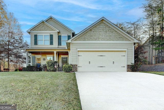 craftsman-style house featuring a front yard and a garage