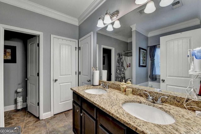 bathroom with vanity and ornamental molding