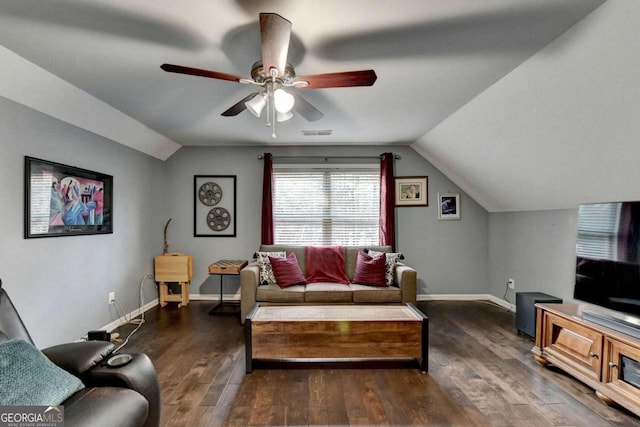 living room with ceiling fan, dark hardwood / wood-style flooring, and lofted ceiling