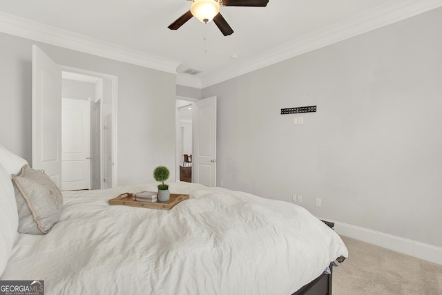 bedroom with carpet, ceiling fan, and ornamental molding