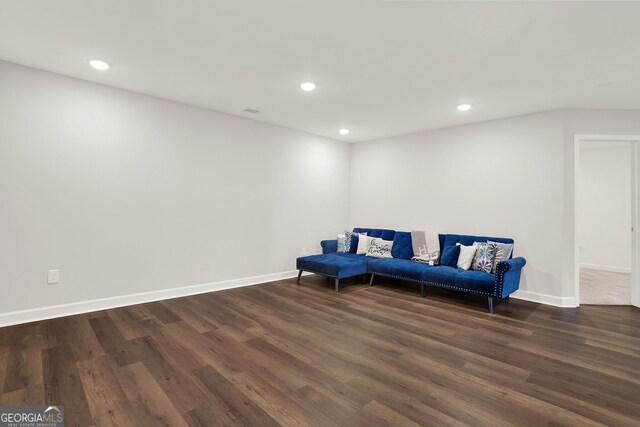 living area featuring dark wood-type flooring