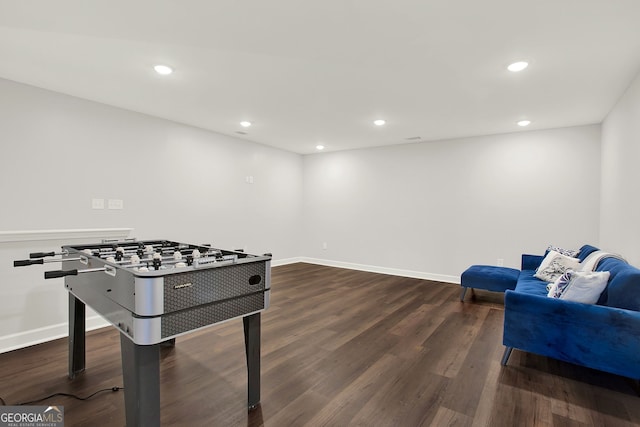 recreation room featuring dark wood-type flooring