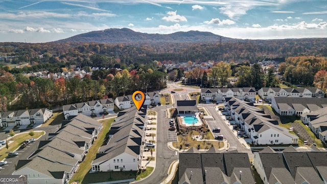 drone / aerial view featuring a mountain view