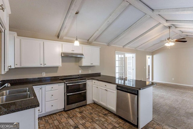 kitchen with sink, vaulted ceiling with beams, ceiling fan, appliances with stainless steel finishes, and white cabinetry