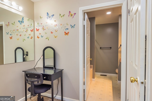 bathroom featuring toilet