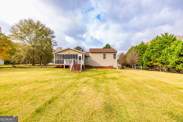 view of yard with a sunroom