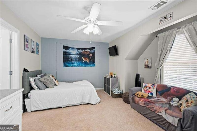 bedroom with light carpet and ceiling fan