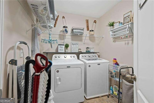 washroom featuring independent washer and dryer