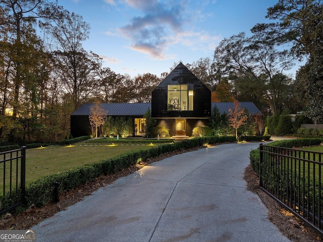 view of front of house with a yard