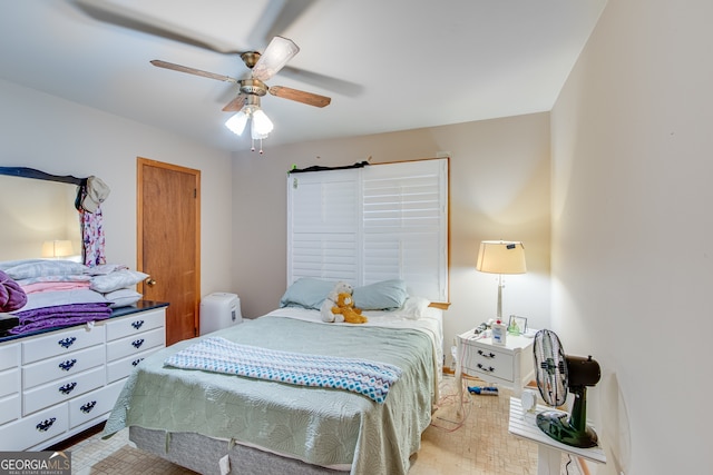 bedroom featuring ceiling fan