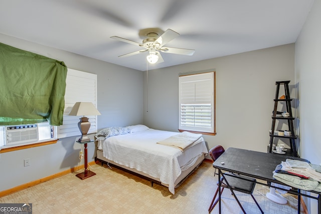 bedroom featuring ceiling fan and cooling unit