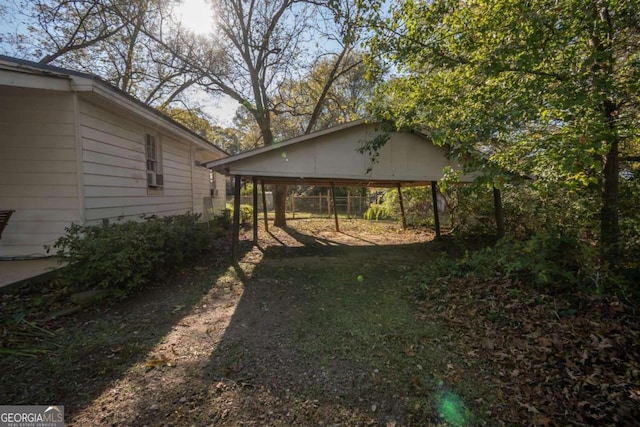 view of yard featuring a carport