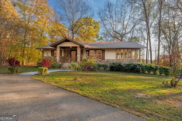 63 Bigham Rd, Trion, GA 30753 - ranch-style home with a front lawn and stone siding