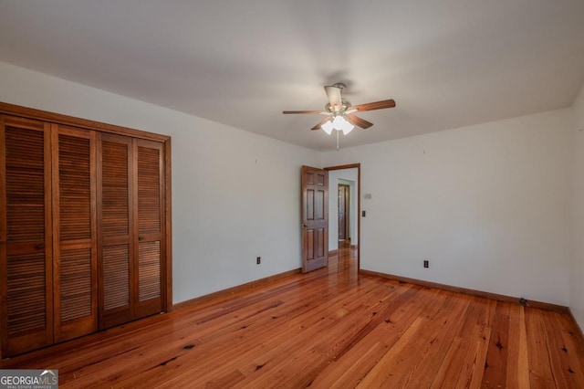 63 Bigham Rd, Trion, GA 30753 - unfurnished bedroom with light wood-type flooring, a closet, ceiling fan, and baseboards