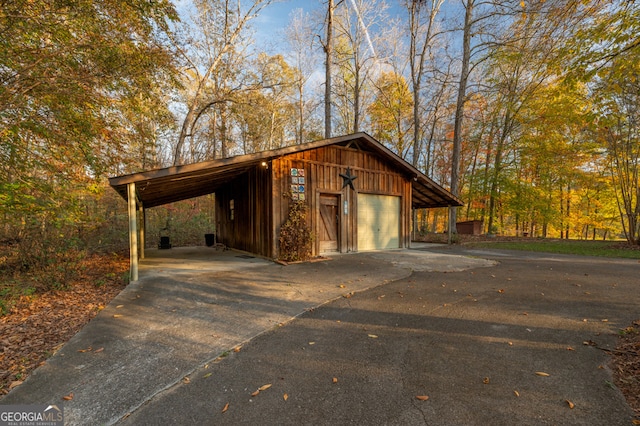 view of outbuilding with a garage