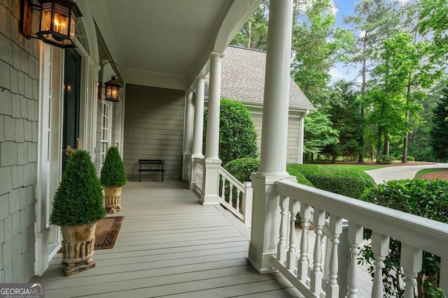 balcony featuring a porch