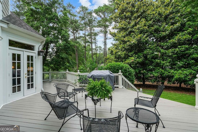 deck featuring area for grilling and french doors