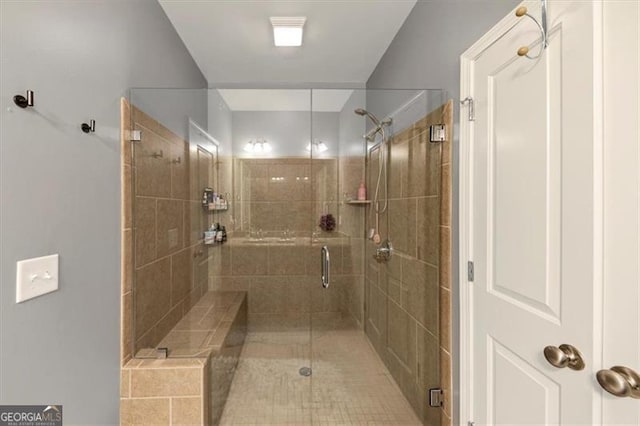 bathroom featuring an enclosed shower