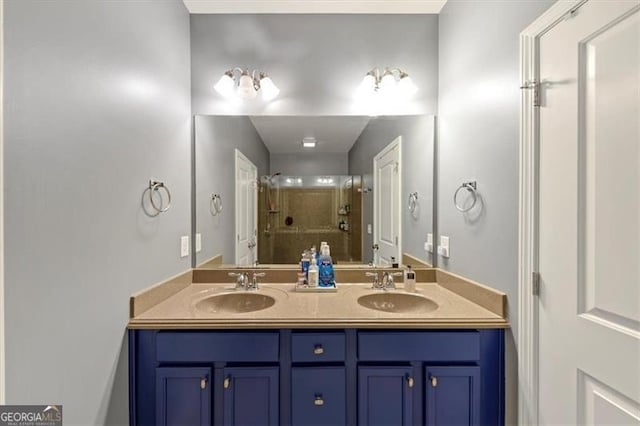 bathroom featuring vanity and an enclosed shower