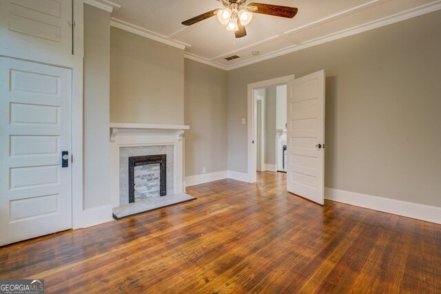 31 N Broad St, Porterdale, GA 30014 - unfurnished living room featuring a ceiling fan, a premium fireplace, wood finished floors, crown molding, and baseboards