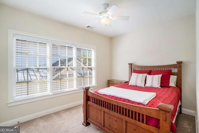 bedroom featuring ceiling fan and carpet floors