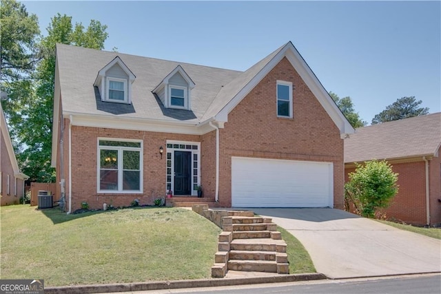 cape cod home with a garage, a front yard, and central AC unit