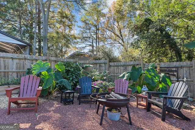 view of patio / terrace featuring an outdoor fire pit