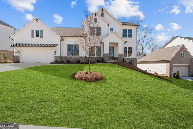 modern inspired farmhouse with a garage and a front lawn