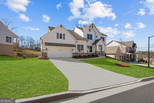 view of front facade with a front yard and a garage