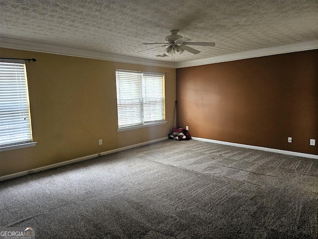 carpeted empty room with a textured ceiling, plenty of natural light, crown molding, and ceiling fan