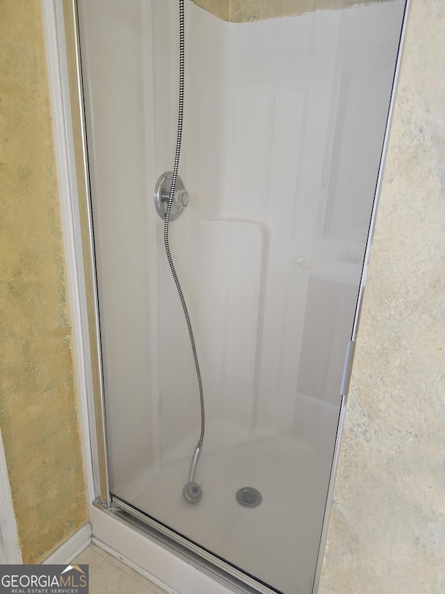 bathroom with an enclosed shower