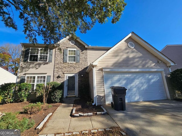 view of front of home with a garage