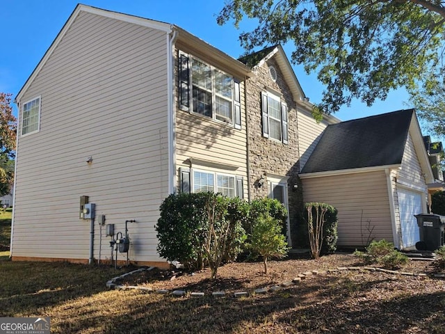 view of home's exterior featuring a garage