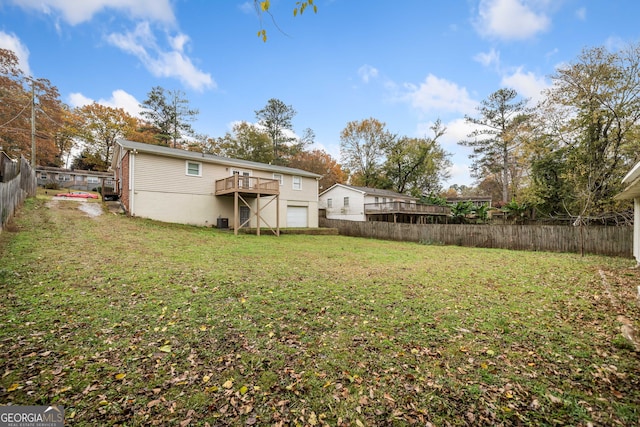 view of yard with a wooden deck